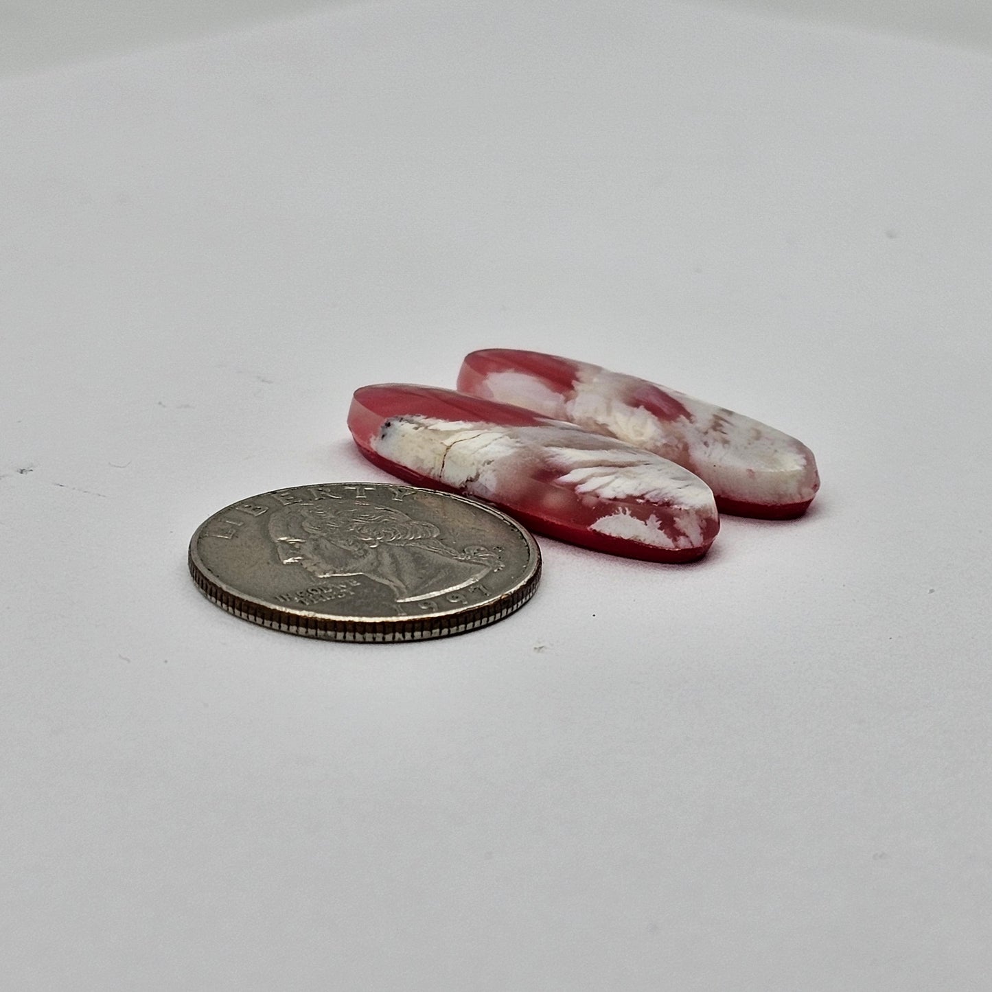 Pink skystone resin cabochon pair