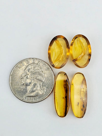 Amber authentic cabochon pair lot
