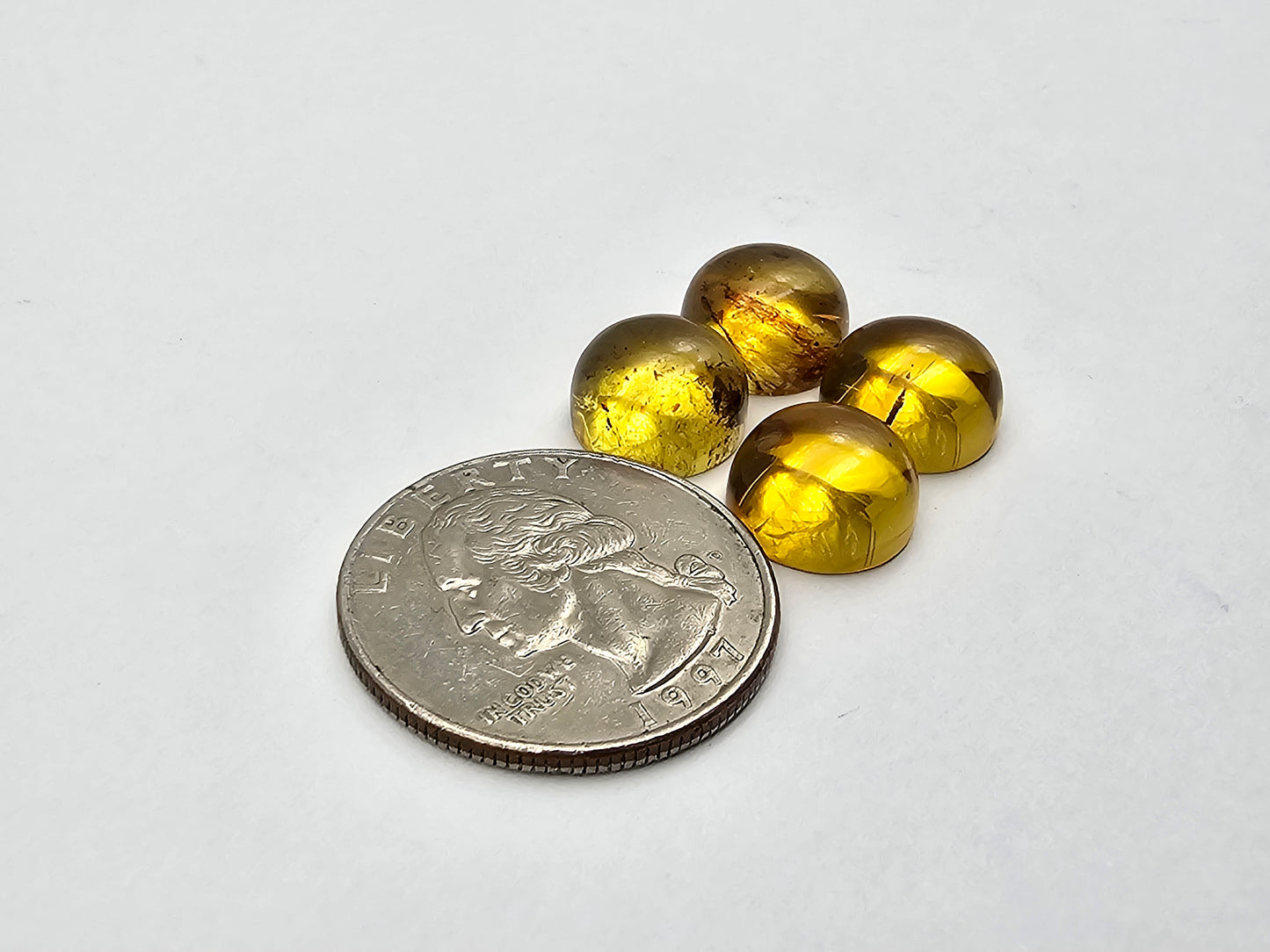 Amber authentic cabochon pair lot