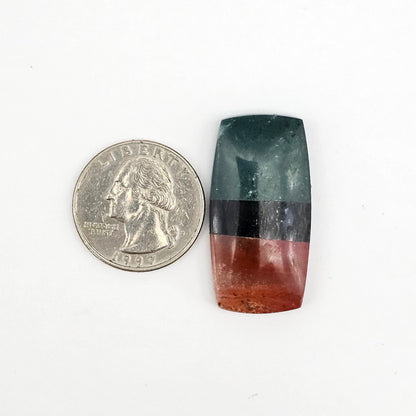 Intarsia inlay cabochon with agate and obsidian