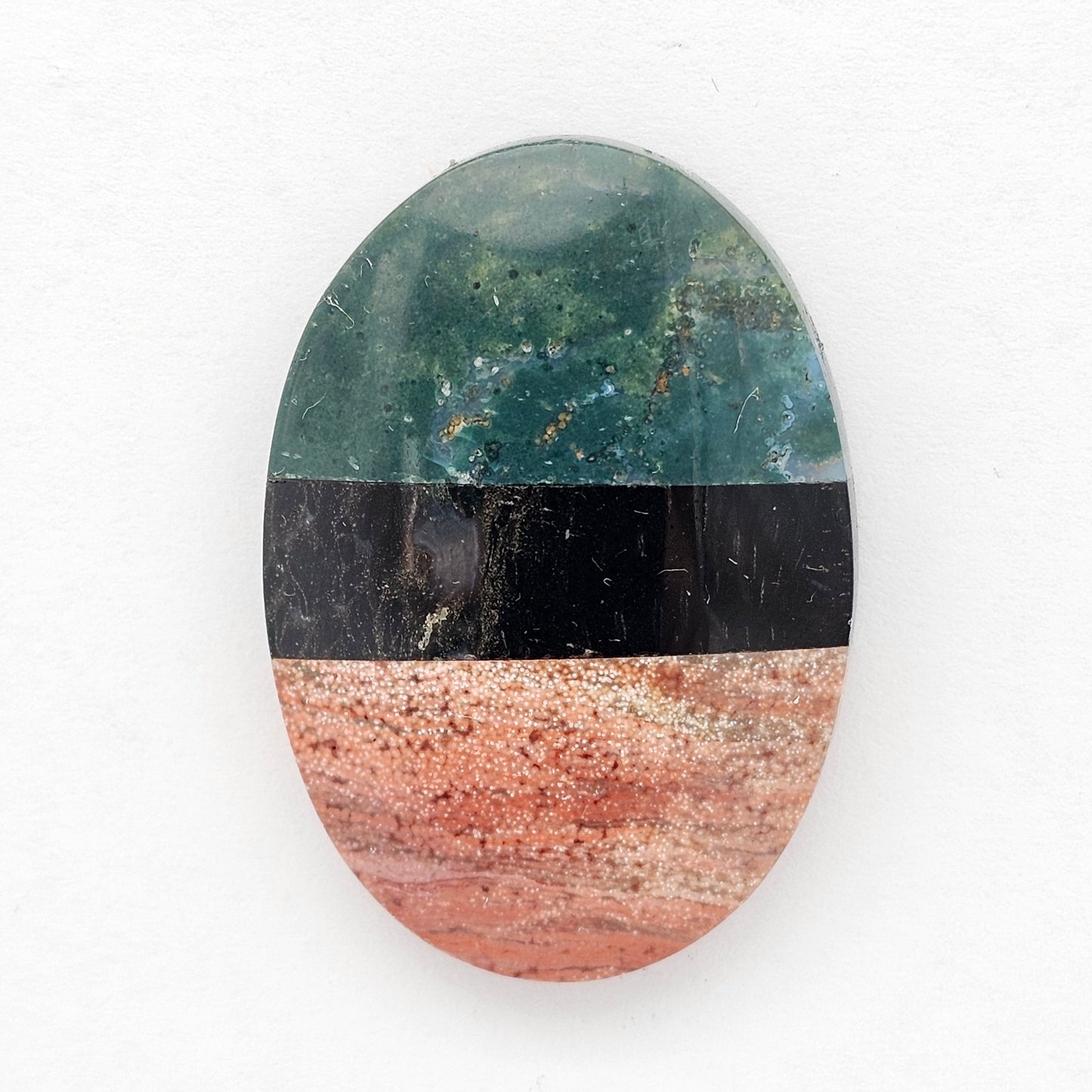 Intarsia inlay cabochon with agate and obsidian