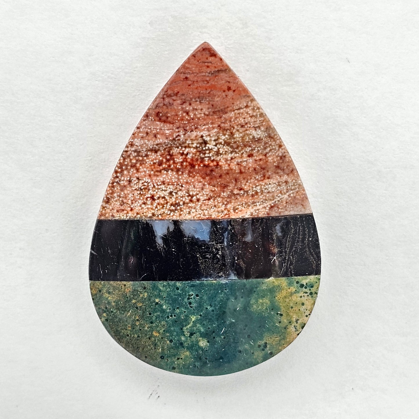 Intarsia inlay cabochon with agate and obsidian