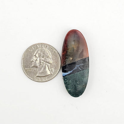 Intarsia inlay cabochon with agate and obsidian