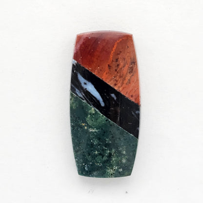 Intarsia inlay cabochon with agate and obsidian