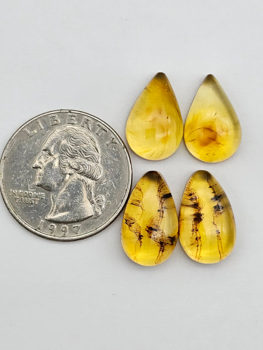 Amber authentic cabochon pair lot