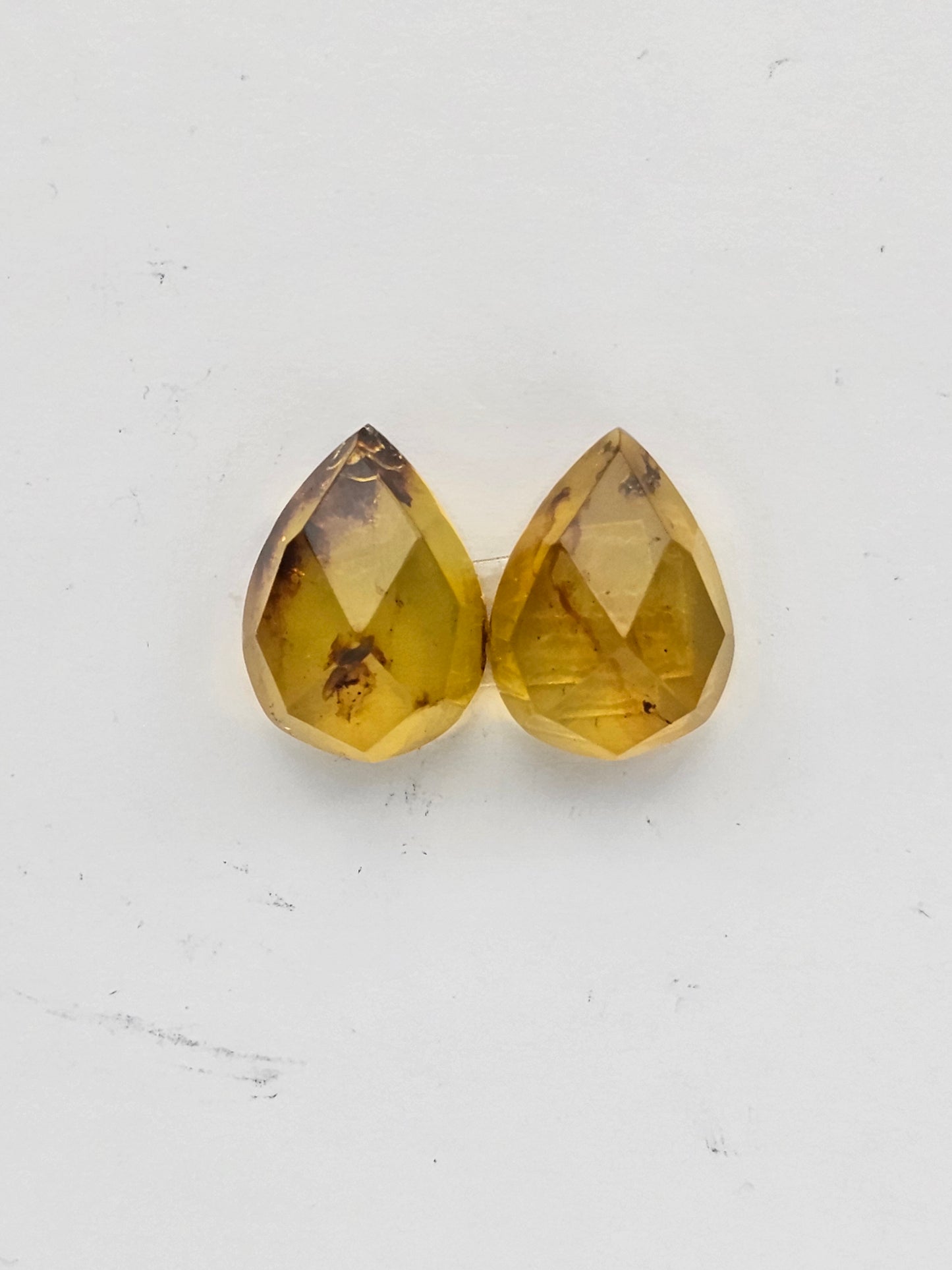 Amber faceted teardrop pair