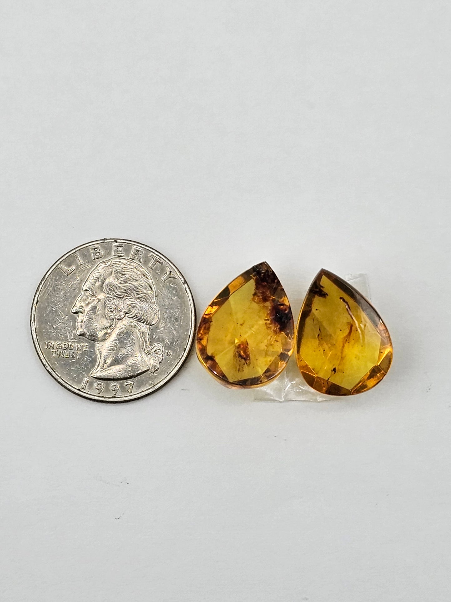 Amber faceted teardrop pair