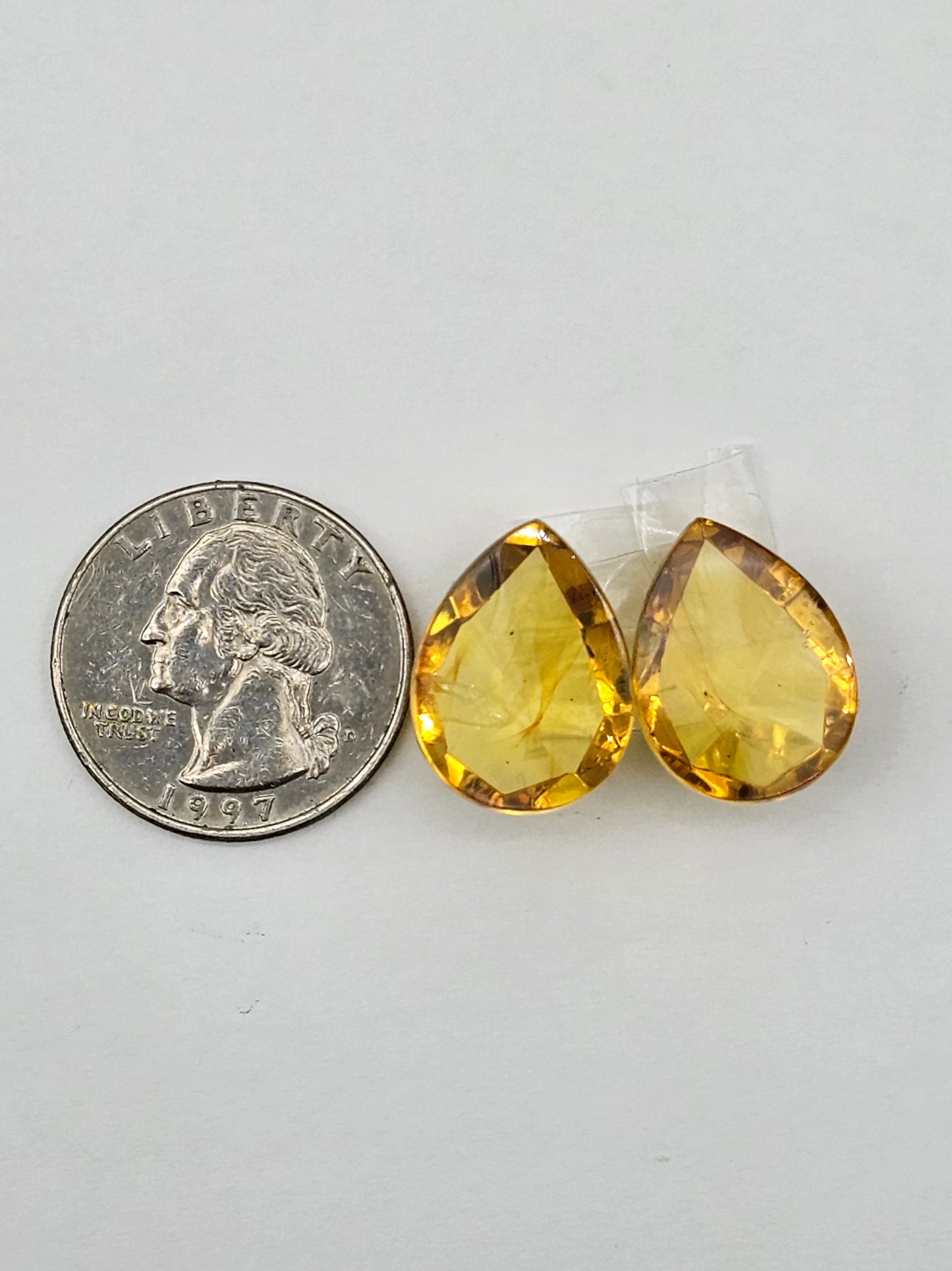 Amber faceted teardrop pair