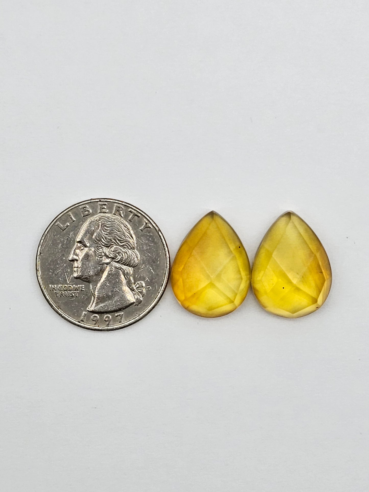 Amber faceted teardrop pair