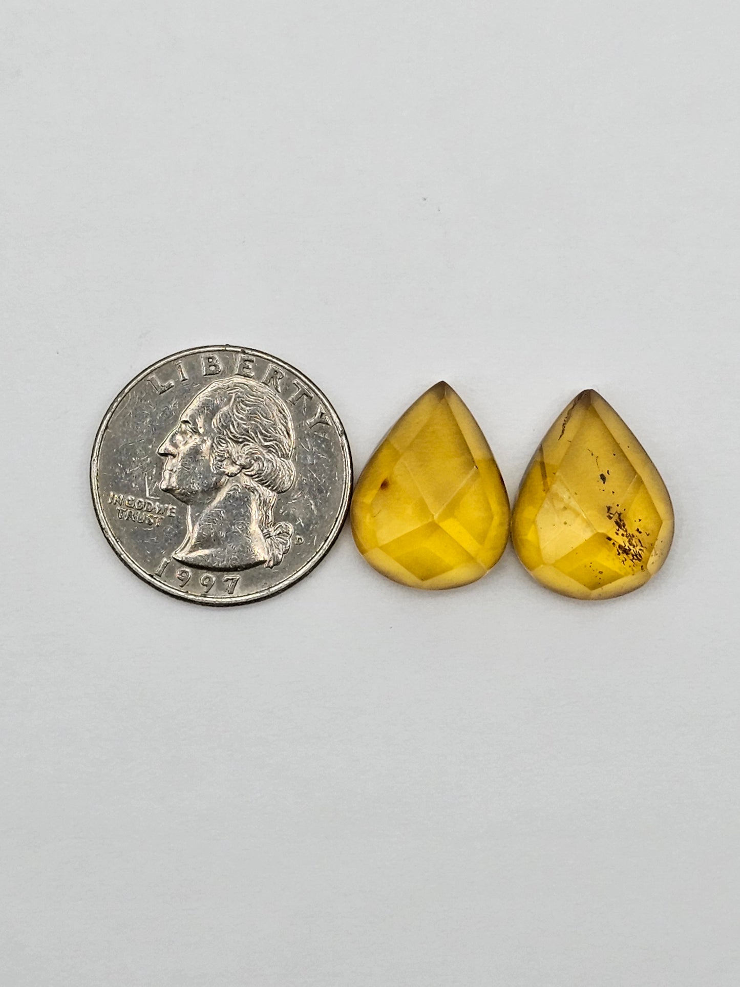 Amber faceted teardrop pair