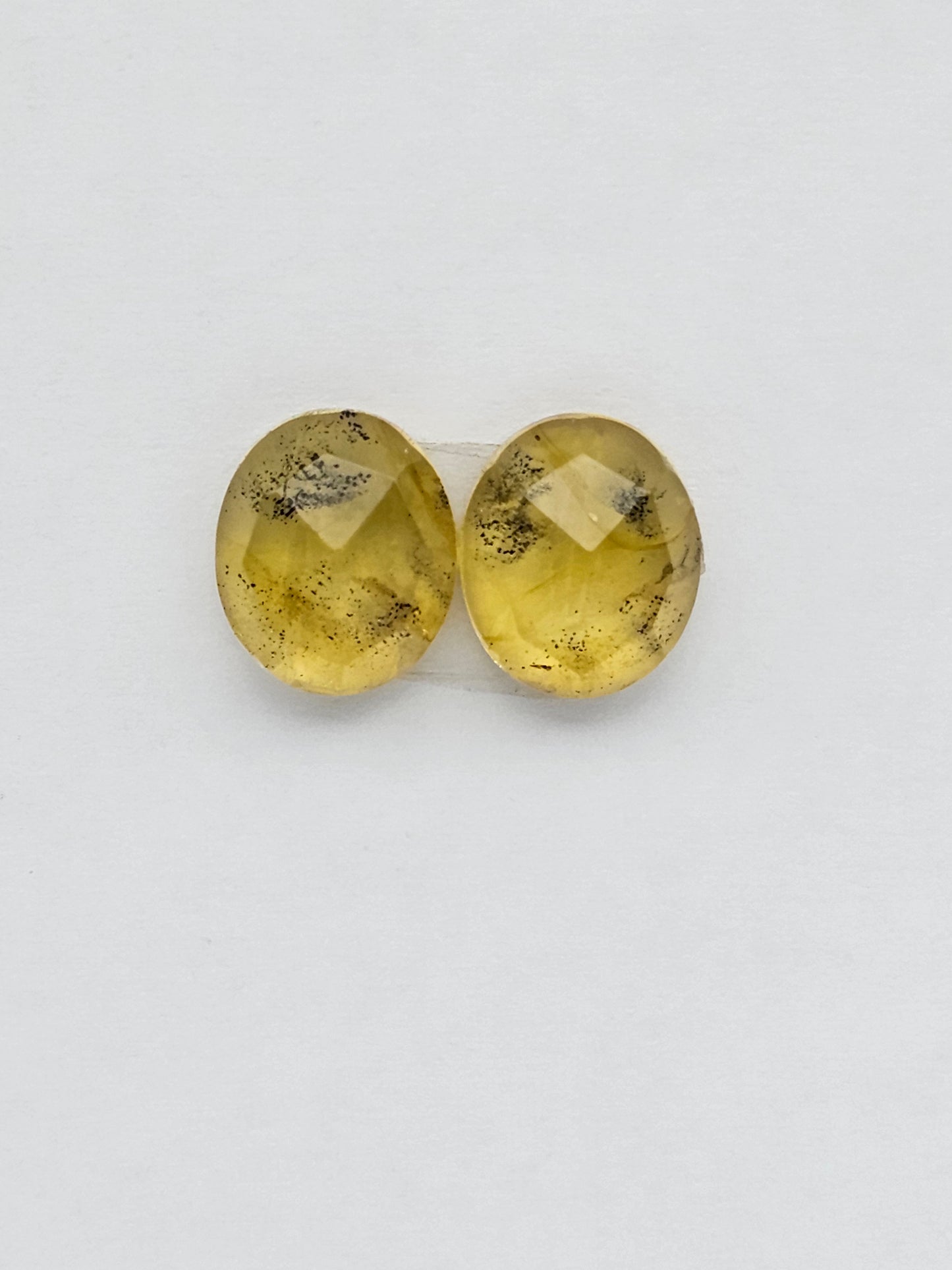 Amber faceted oval pair