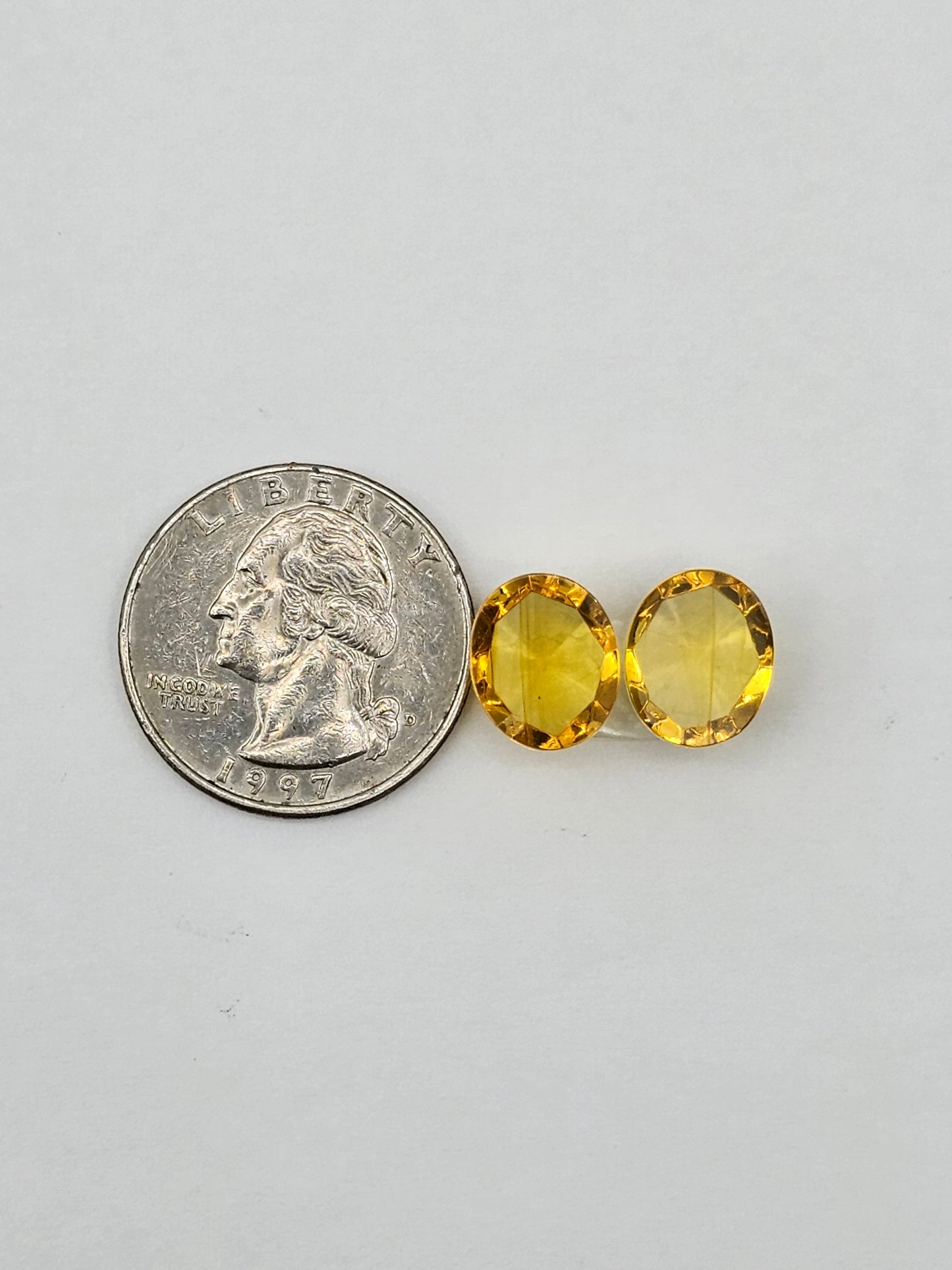 Amber faceted oval pair