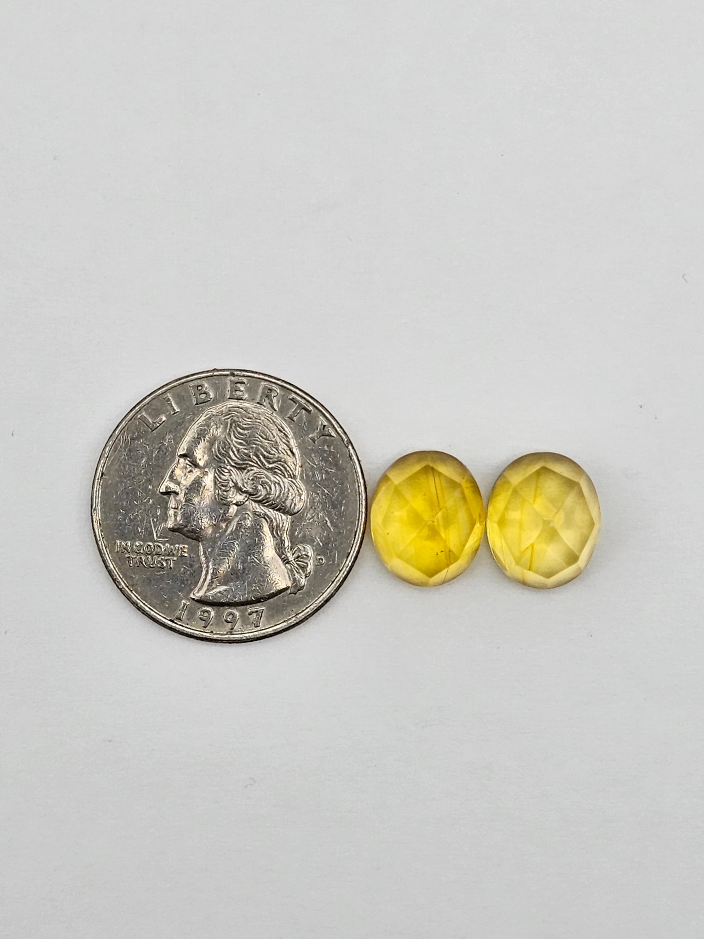 Amber faceted oval pair