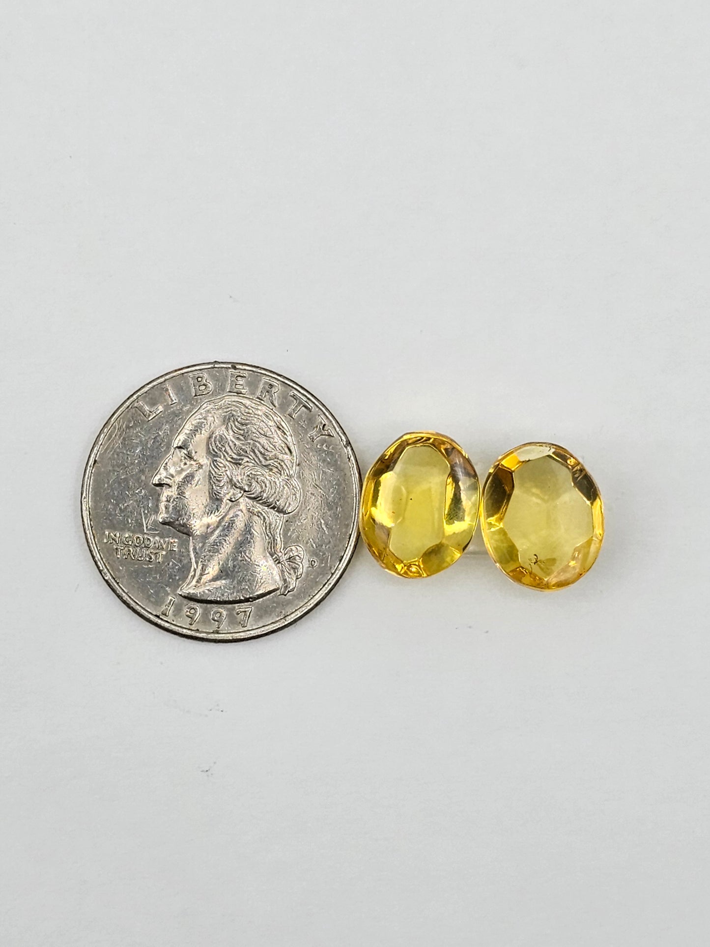 Amber faceted oval pair