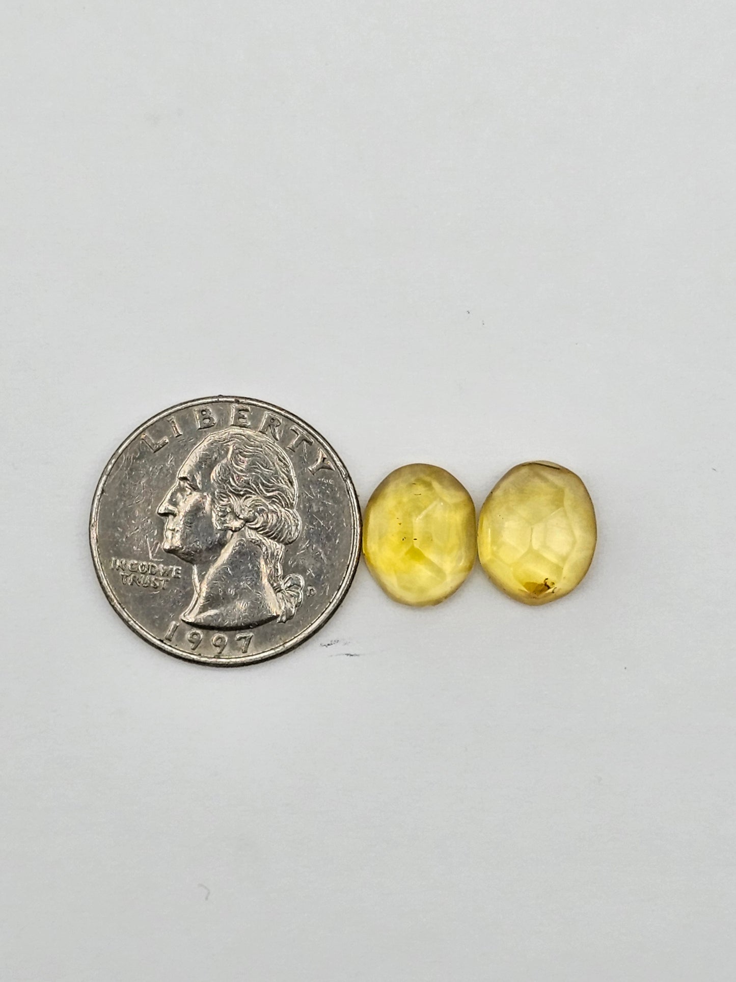 Amber faceted oval pair