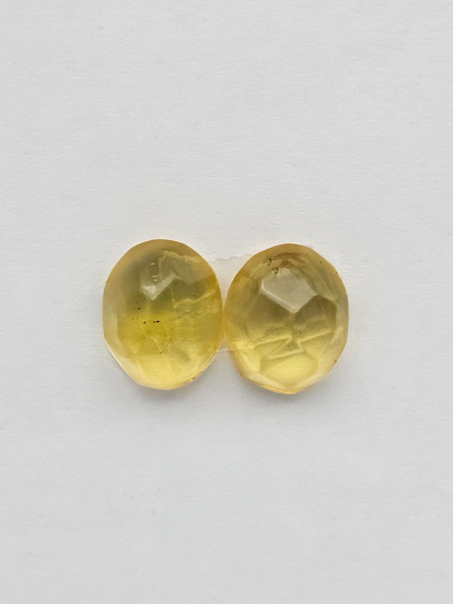 Amber faceted oval pair