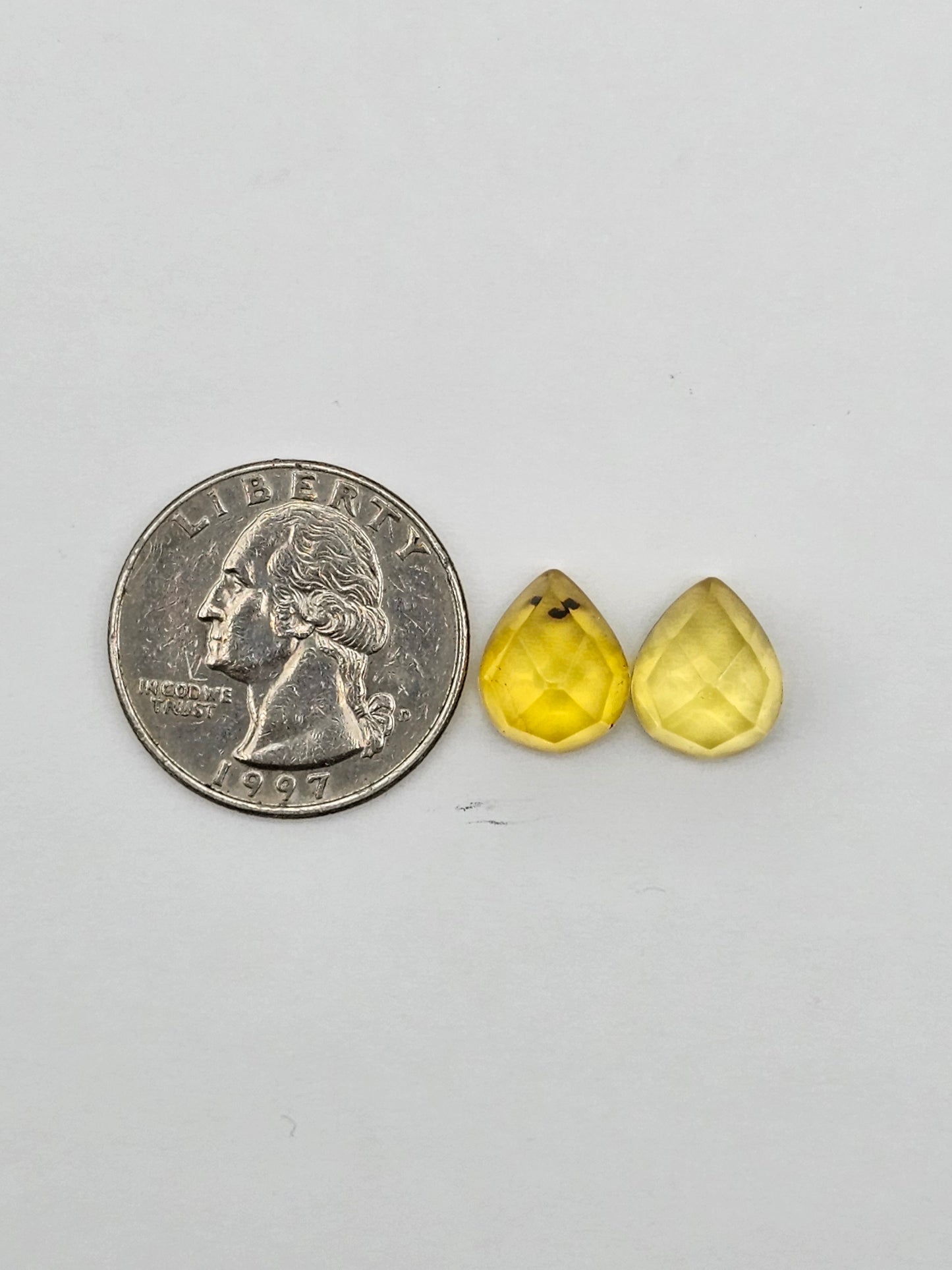 Amber faceted teardrop pair