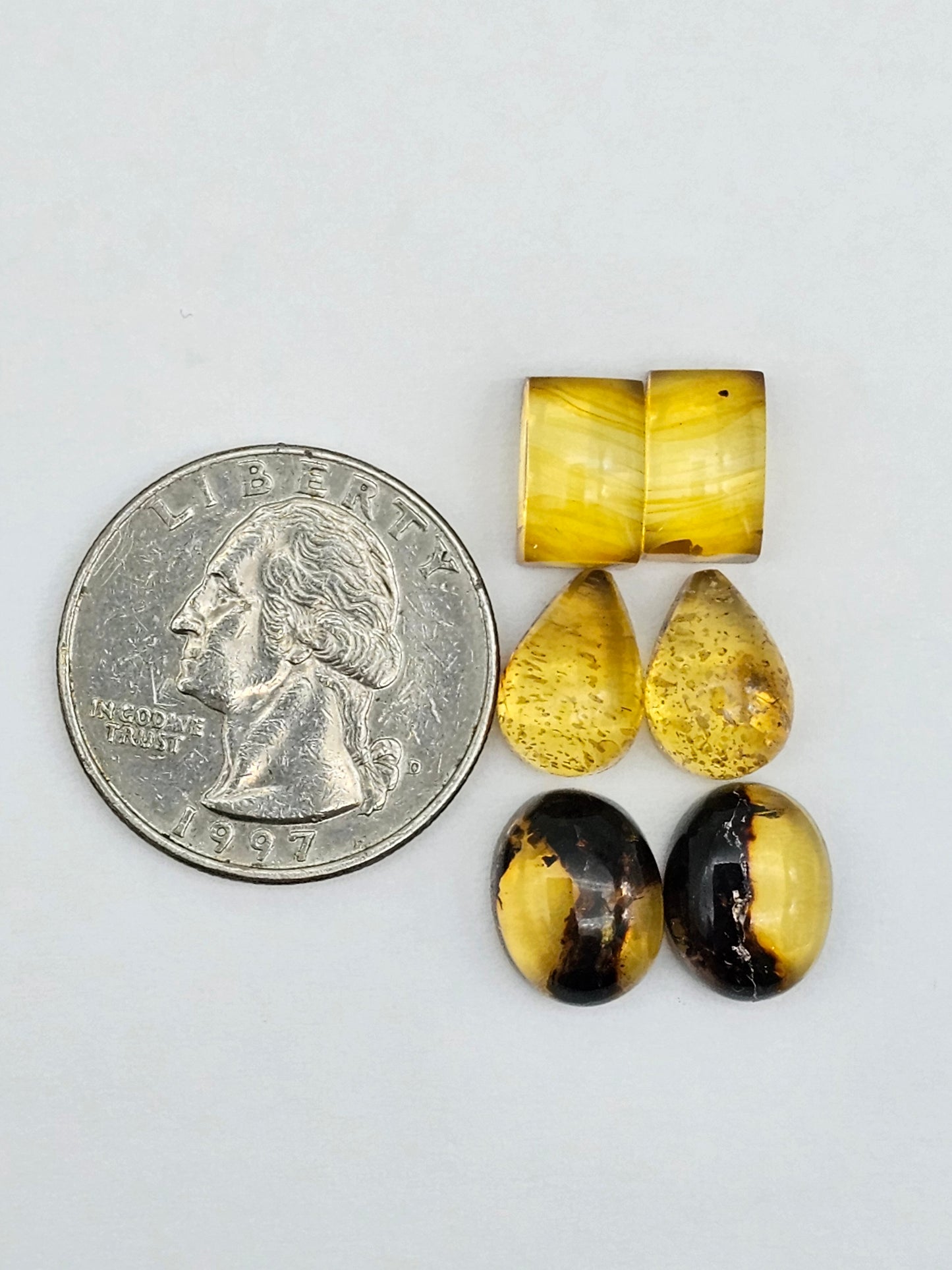 Amber authentic cabochon pair lot