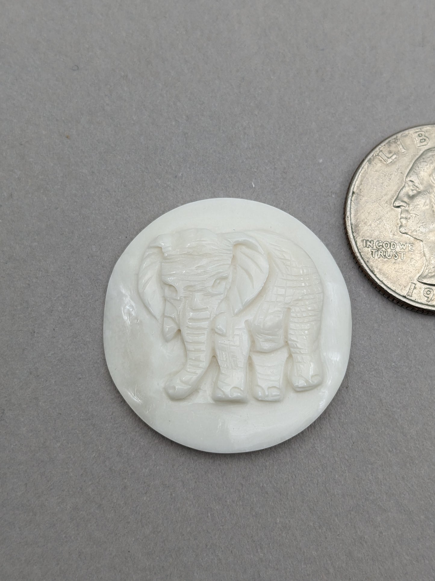 Carved bovine bone elephant cabochon